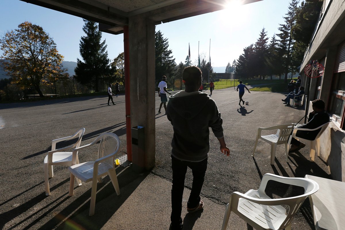 Беженцы в одном из центров приема для просителей убежища в Провансе, Швейцария, 28 октября 2014 года. Фото: Denis Balibouse / Reuters / Scnapix / LETA